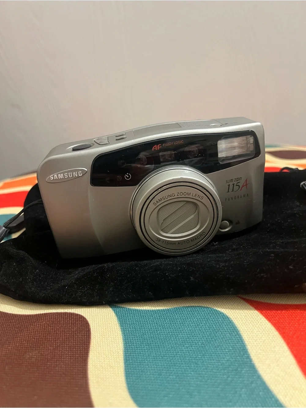 Vintage Samsung Slim Zoom 115A Panorama 35mm film camera with a 38-115mm lens